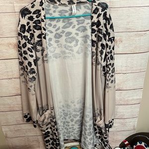 Super fun animal print cardigan with pockets!